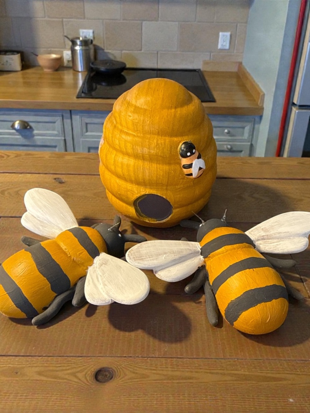 Trio set of bumble bees' and hive